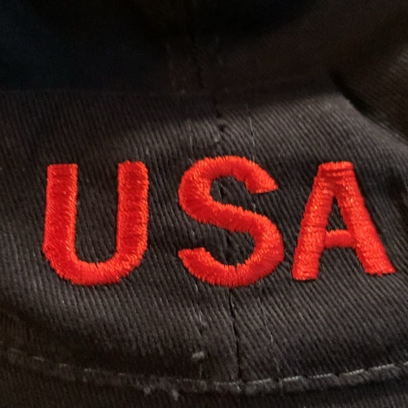 Navy hat w/ red embroidered USA.  Velcro strap in back. One size fits all - Picture 6 of 7